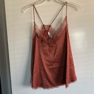 Dusty rose satiny blouse.